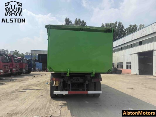 شاحنة " سينوتروك " مستعملة " هوو تكس " 8×4 للبيع في غينيا